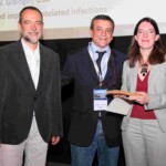 M. Stevens receiving the award from M. Barbosa, president of the award committee, and L. Ambrosio, ESB president
